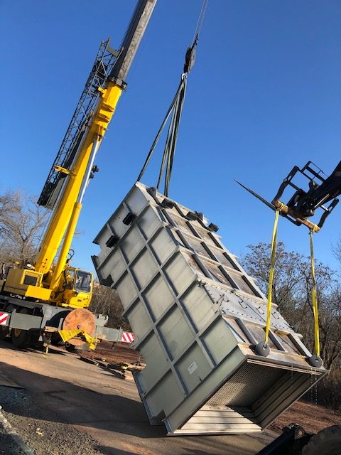 tipping a heat exchanger in preparation for moving