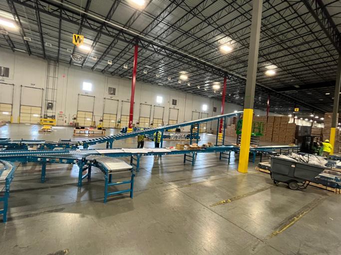 material handling conveyor system being installed by MJ Nester employees